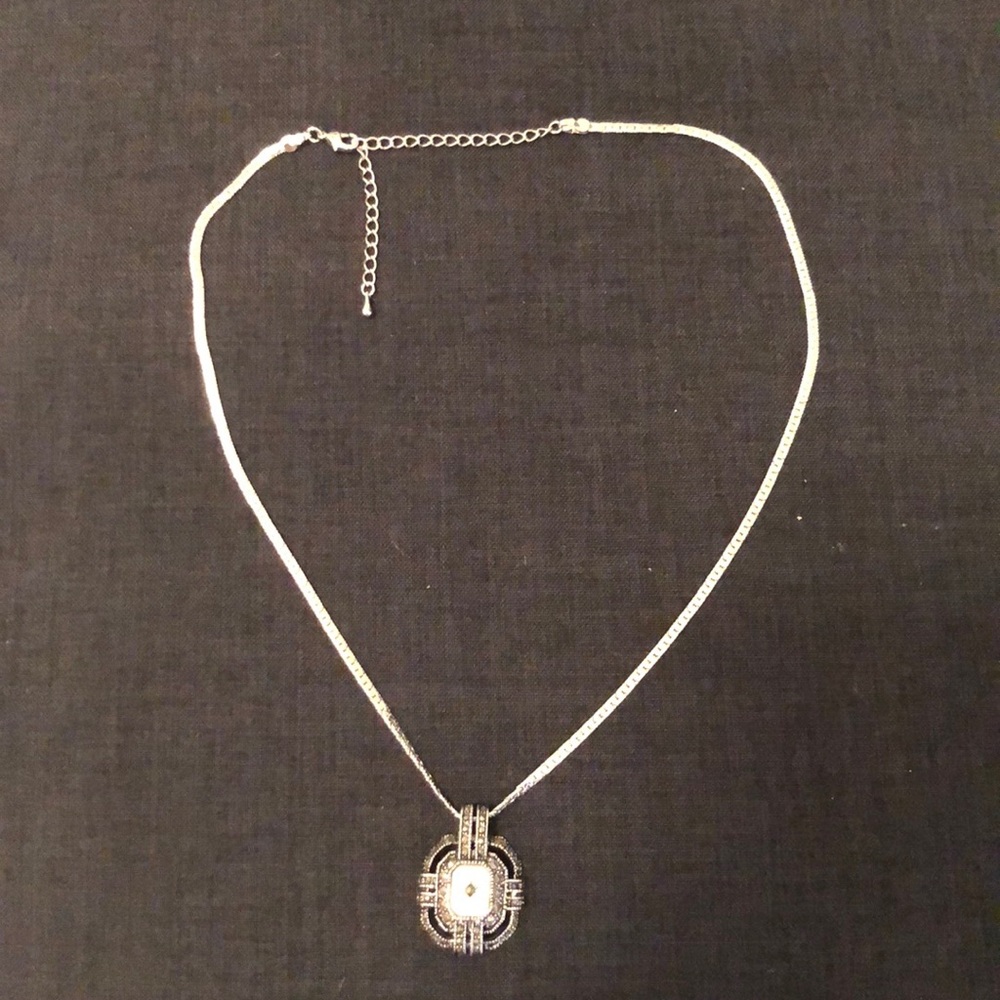 Silver chain and opal pendant